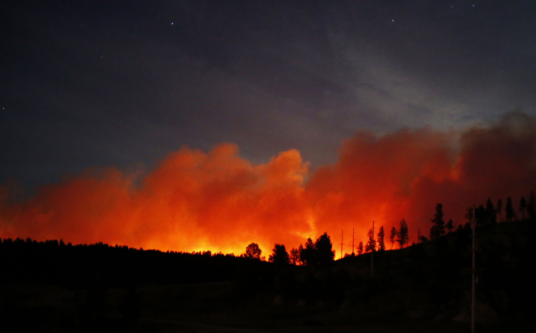 Fire glow near Roundup